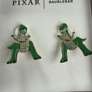 BaubleBar Green and Silver Dinosaur Earrings
